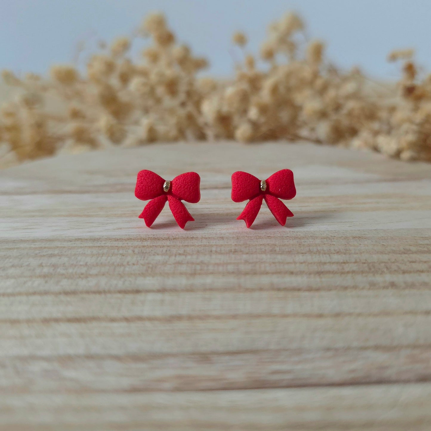 Mini red bow stud earrings