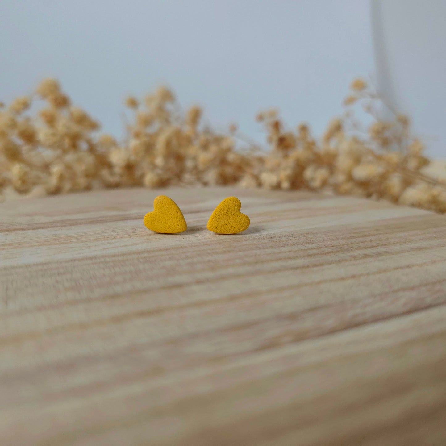Mini yellow heart stud earrings