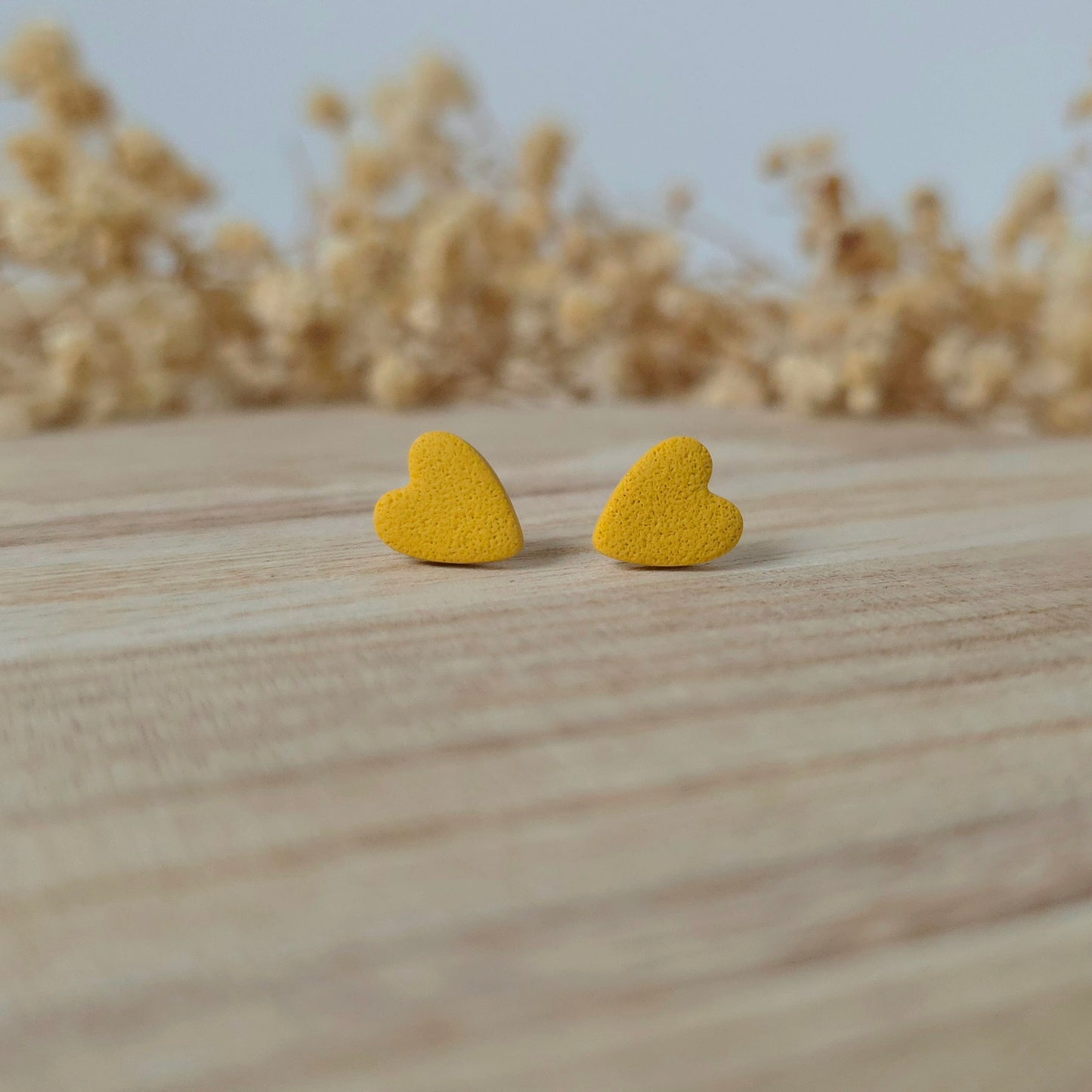 Mini yellow heart stud earrings