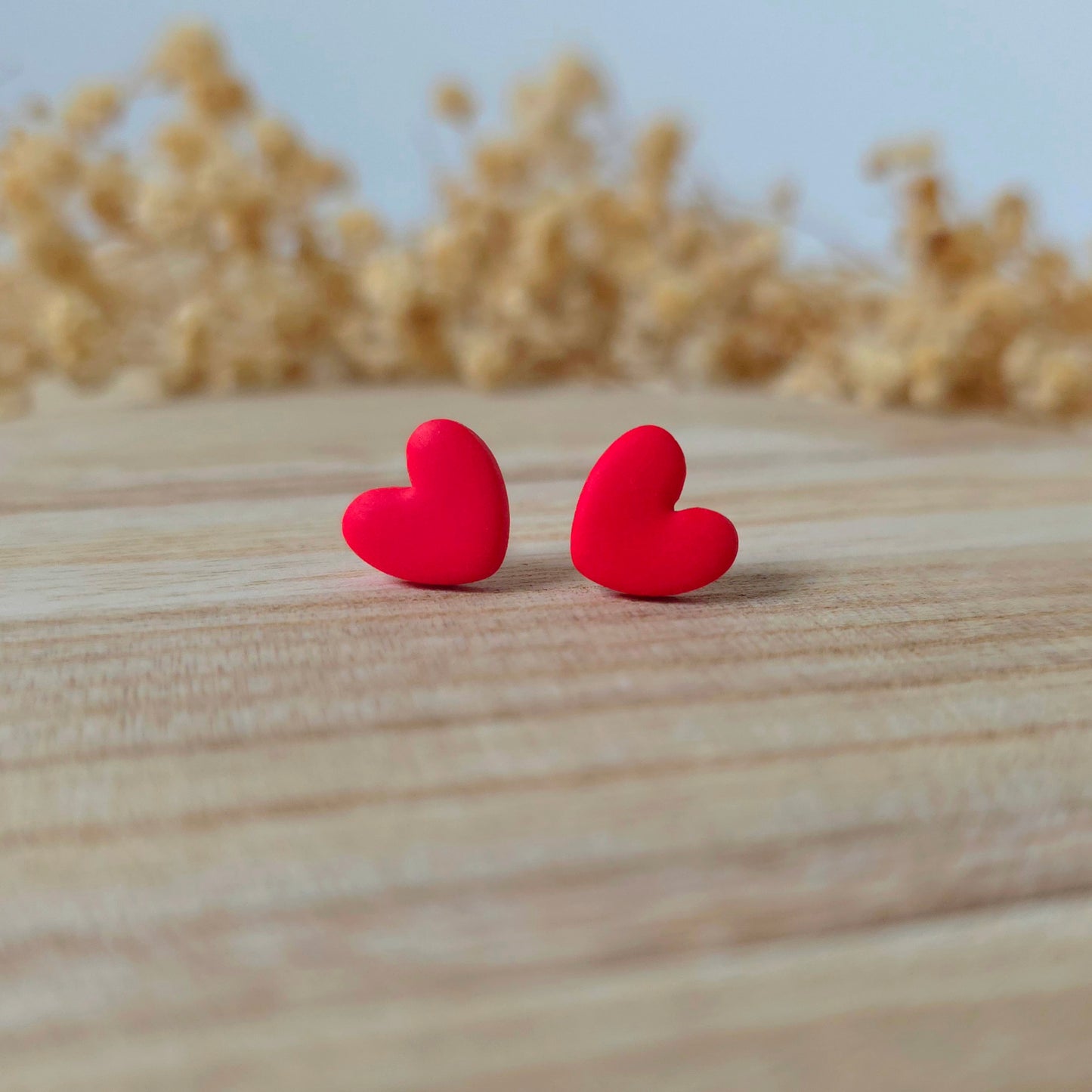 Red heart stud earrings
