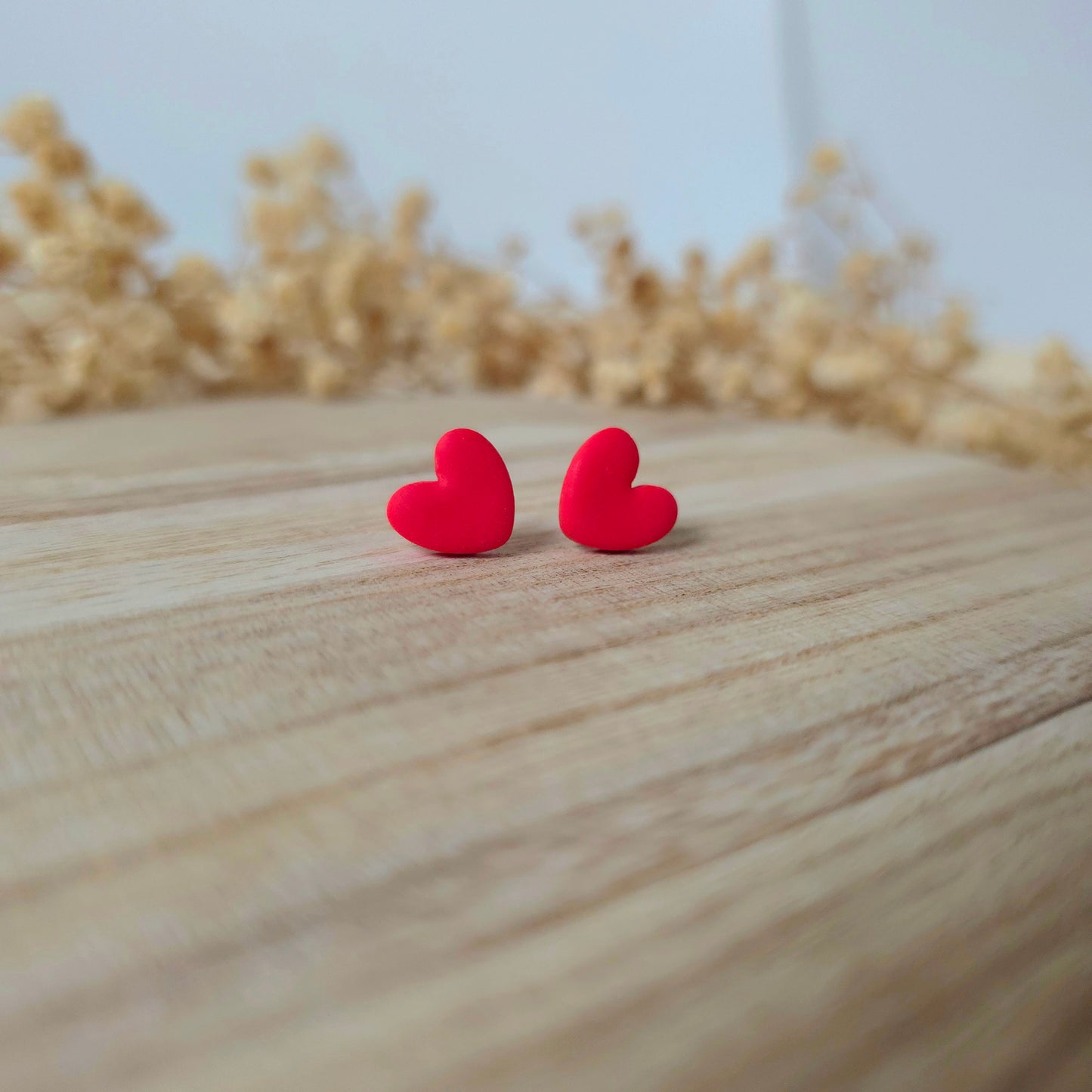 Red heart stud earrings