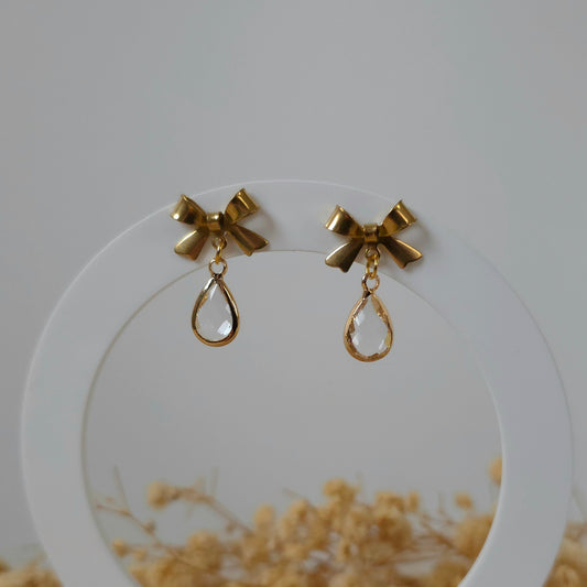 Golden bow and mini clear drop earrings