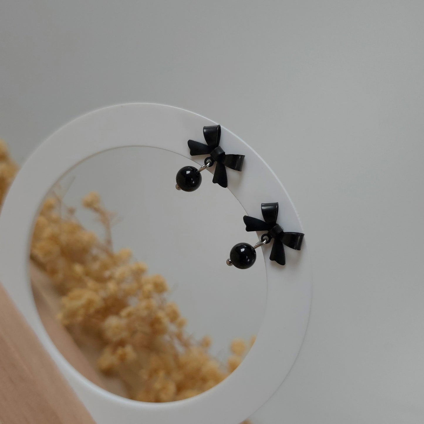 Black bow and onyx earrings