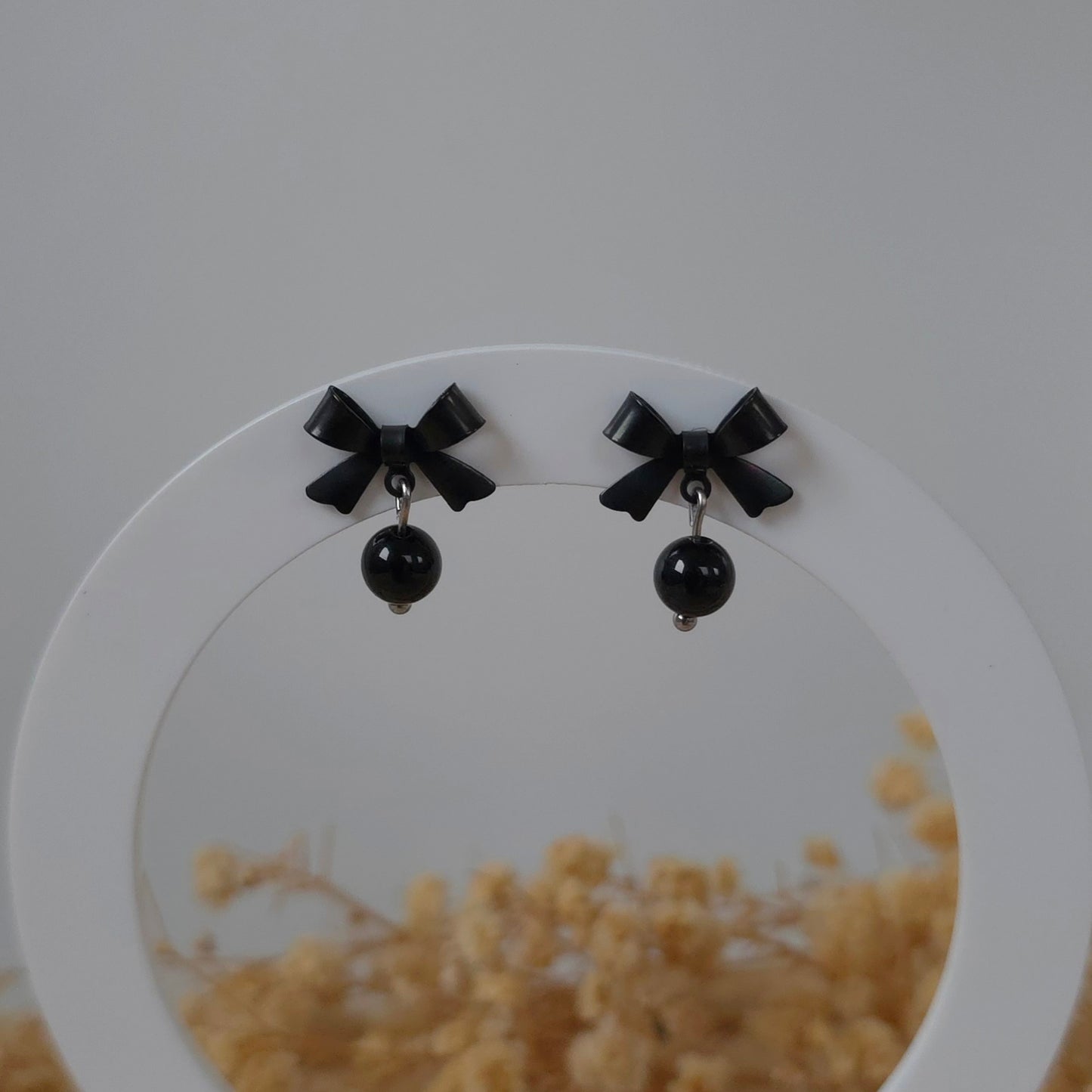 Black bow and onyx earrings