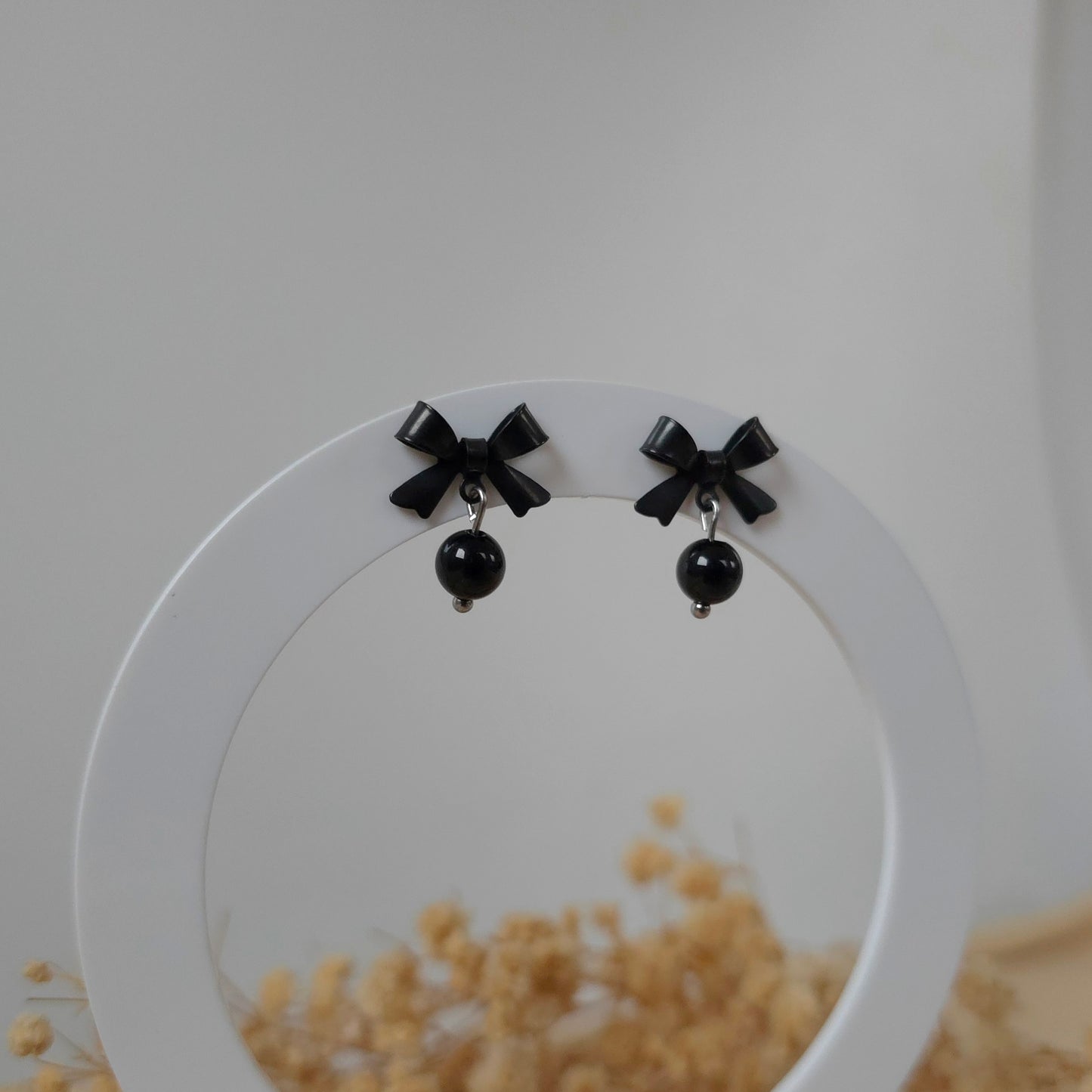 Black bow and onyx earrings