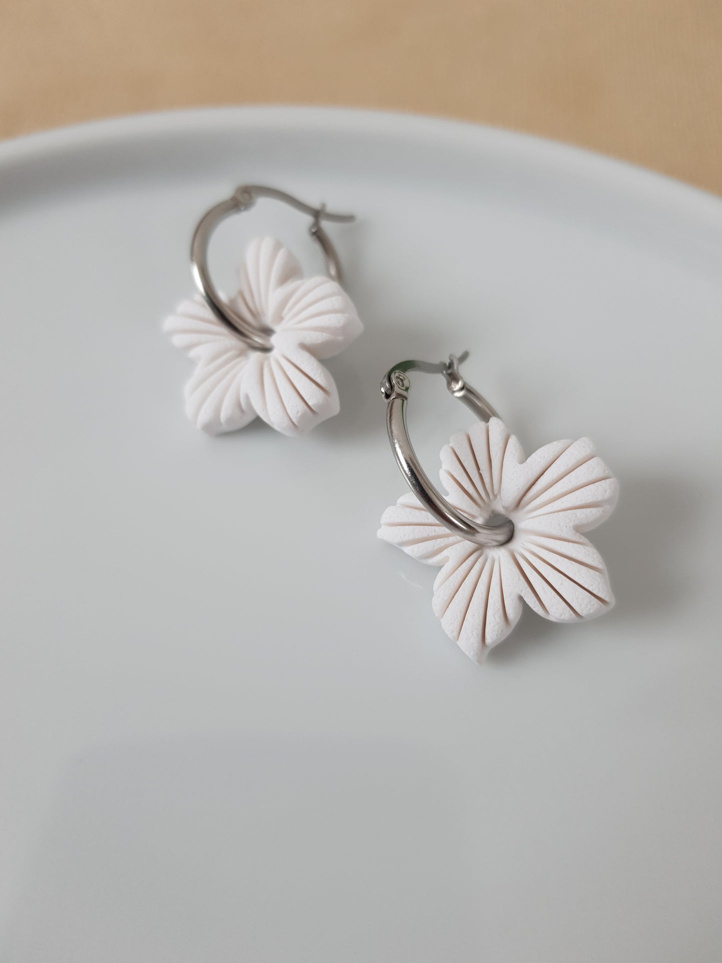 White flower charm earrings