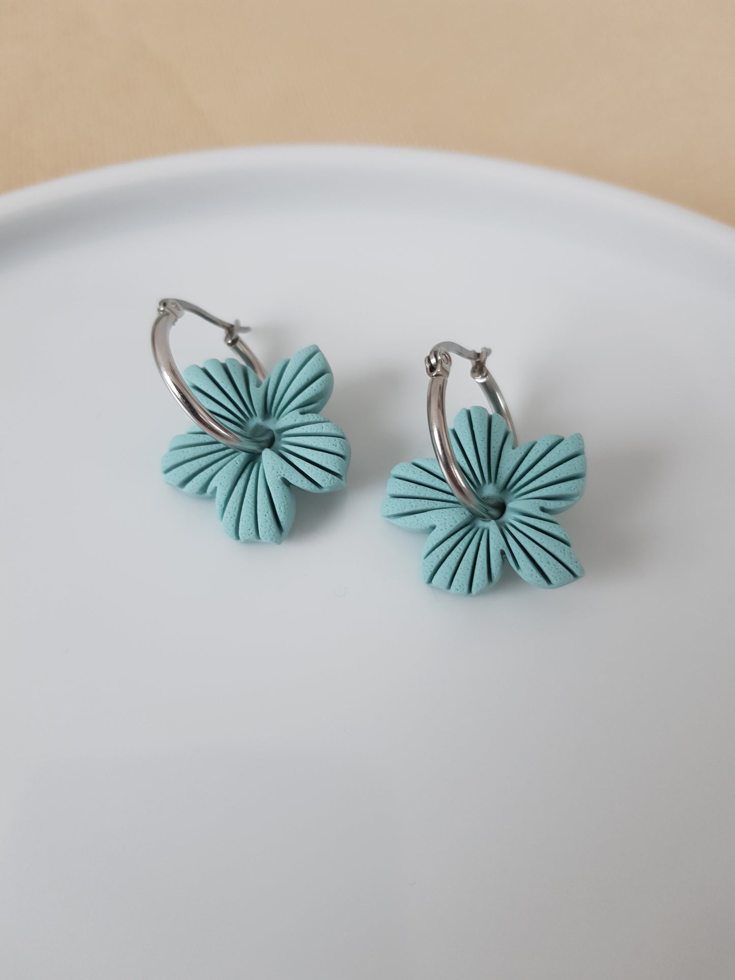 Blue flower charm earrings